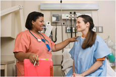 Nurse speaking with patient