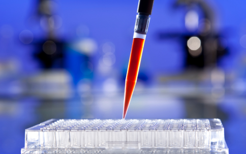 Image of a pipette with a red liquid