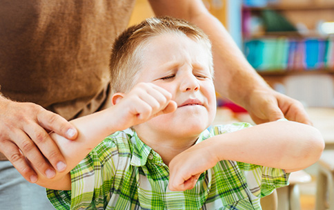 Frustrated Child Being Calmed.