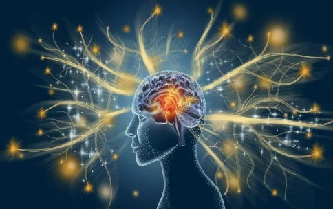 Image of a human with the brain highlighted and bright lights emerging from the head