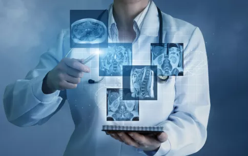 An illustrative image showing a doctor looking at medical images.